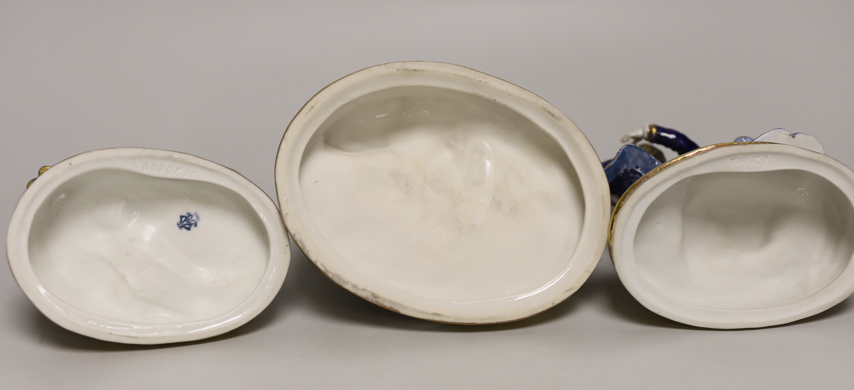 Three German porcelain figure groups, the pair 17cm